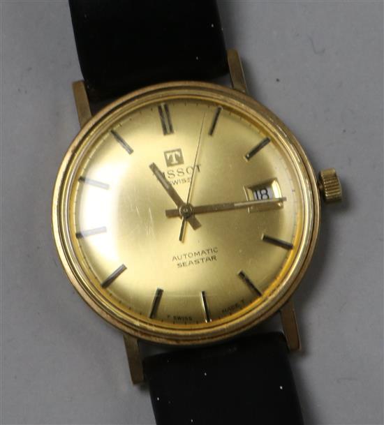 A gentlemans gold Tissot Seastar automatic wrist watch.